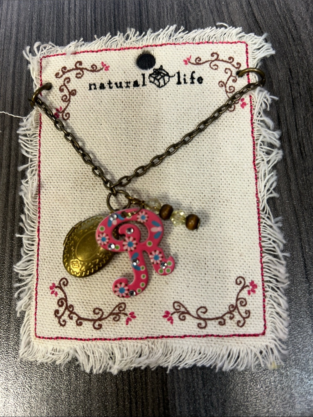 NATURAL LIFE Pink Floral 'R' Charm Necklace with Bronze Medallion